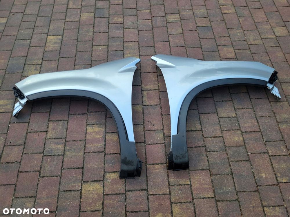 blotnik prawy lewy przod kia sorento ii lift - 1