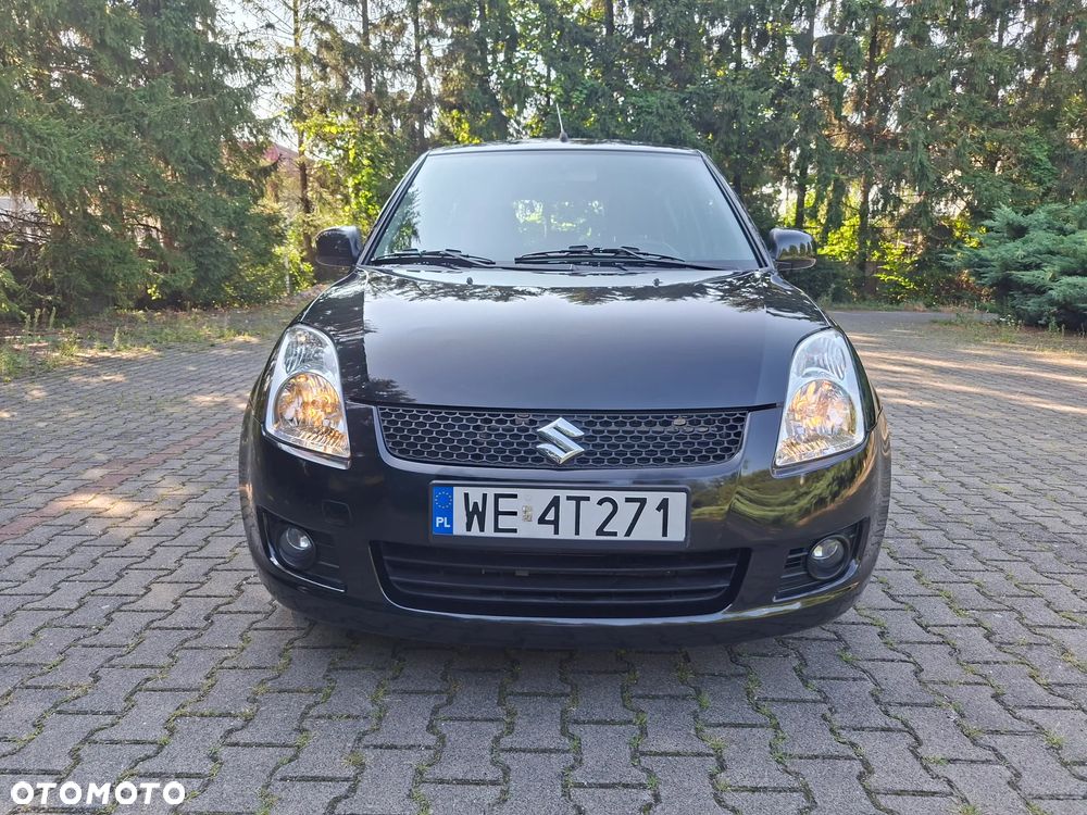 Suzuki Swift 1.5 GLX / Comfort - 1