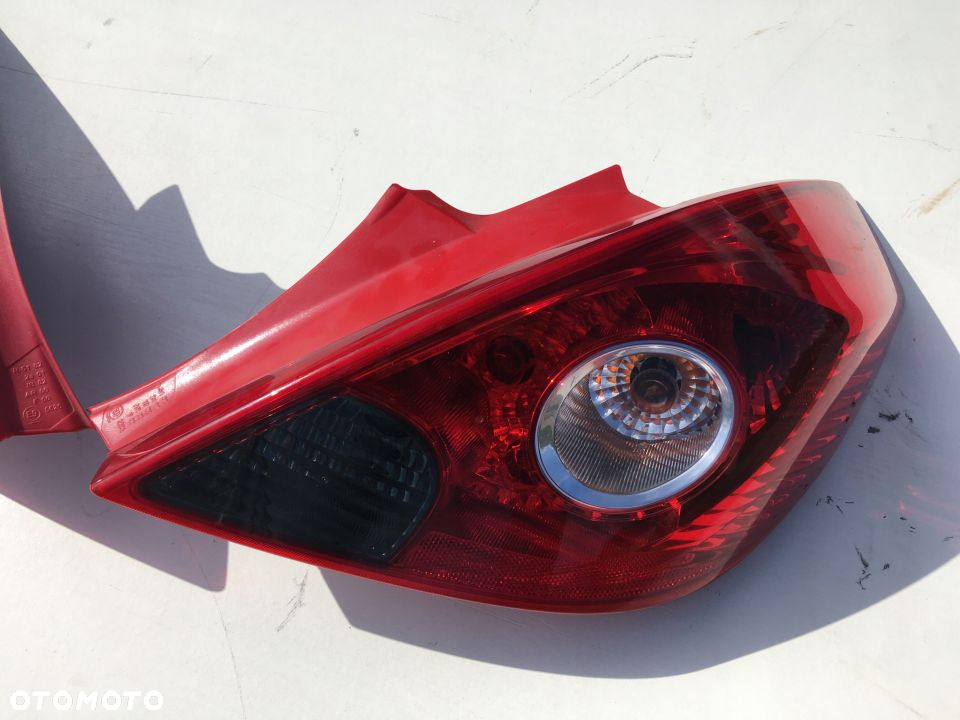 OPEL CORSA D 06- LAMPA PRAWA LEWA EUROPA 3D ORYG. - 3