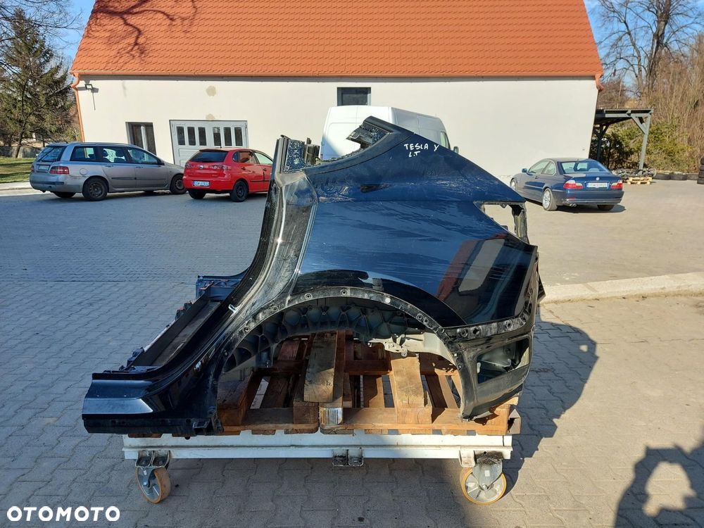 TESLA MODEL Y 2022r ĆWIARTKA BŁOTNIK LEWY TYŁ czarny PBSB - 1