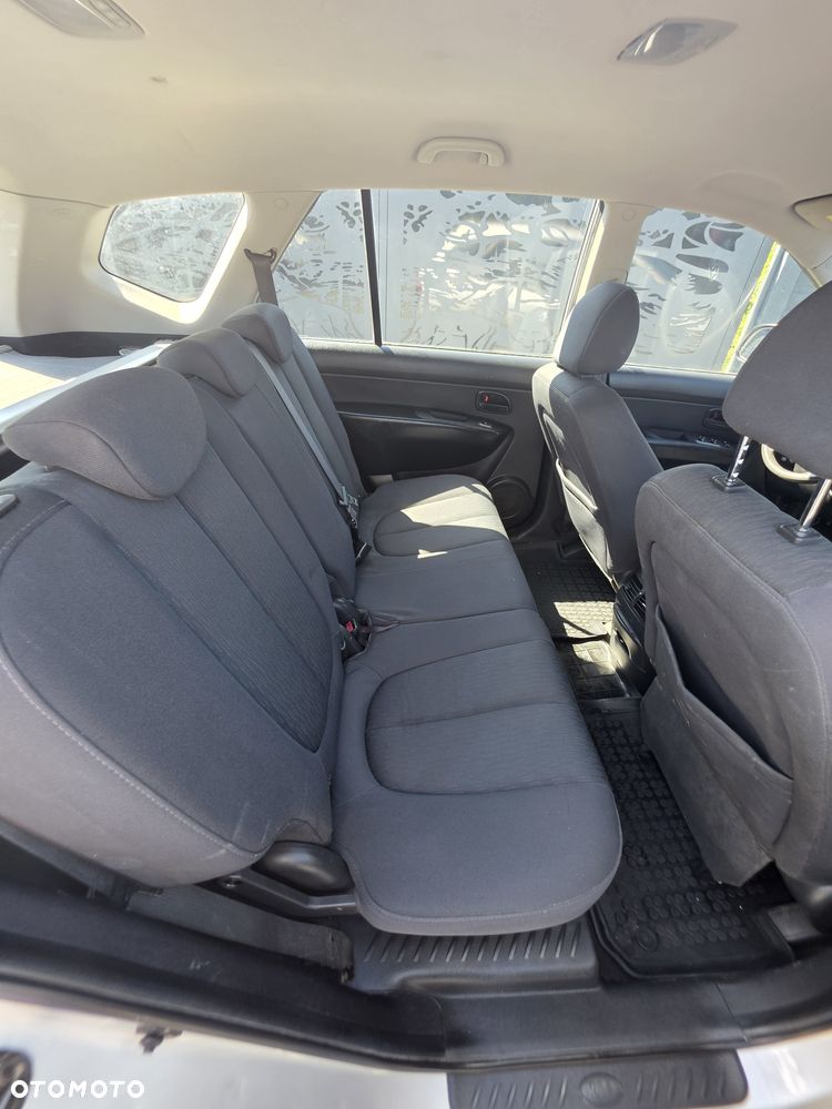 Kia Carens - 7