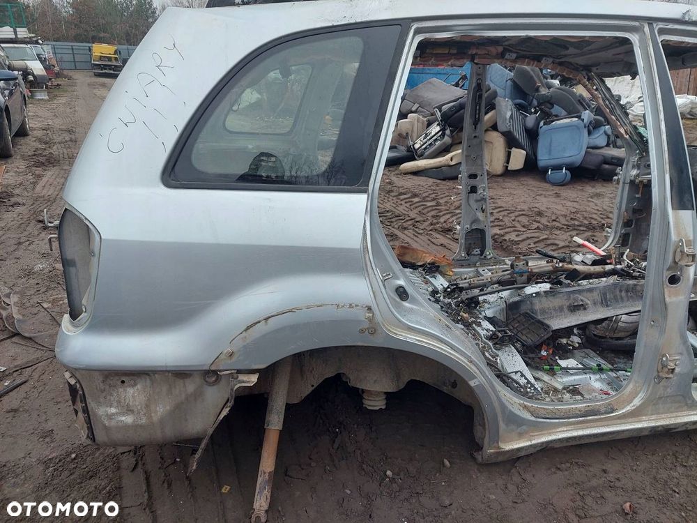 ĆWIARTKA BŁOTNIK PRAWY TYŁ TOYOTA RAV4 II 5D 1D4 - 1