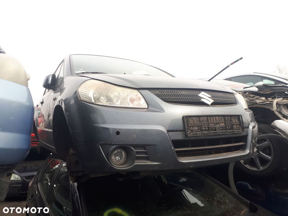 SUZUKI SX4 06-09 1.6 16V OSŁONA PRZECIWSŁONECZNA PRAWA LEWA - 1