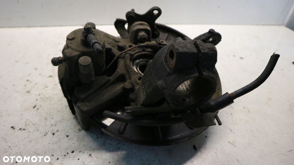 zwrotniza zacisk lewy przód vw golf v # - 3