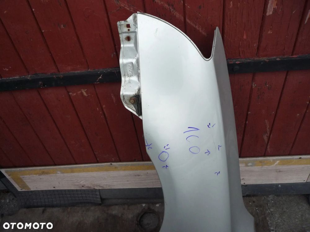 TOYOTA AVENSIS T25 BŁOTNIK LEWY 1C0 - 2