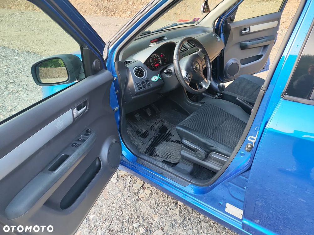 Suzuki Swift 1.3 DDiS 16v GLX - 13