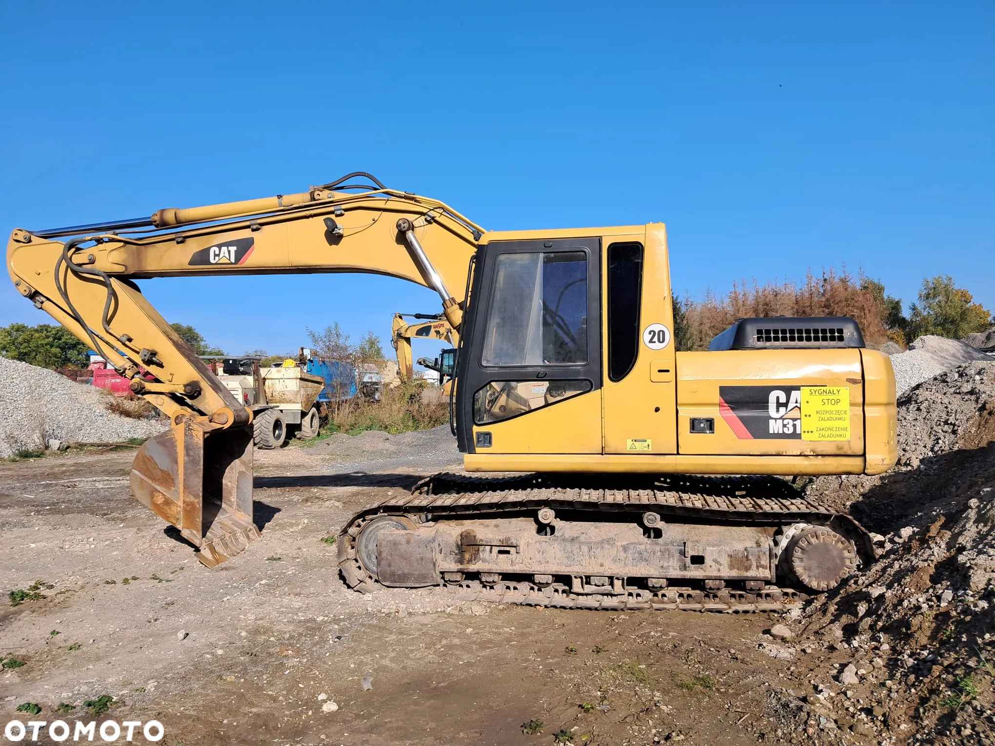 Caterpillar 318 B - 12