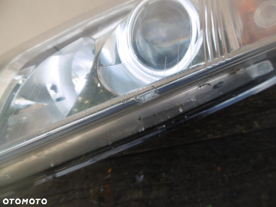 lampa lewa Passat B5 FL Hella Europa - 3