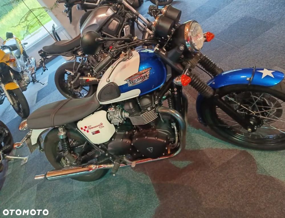 Triumph T - 1