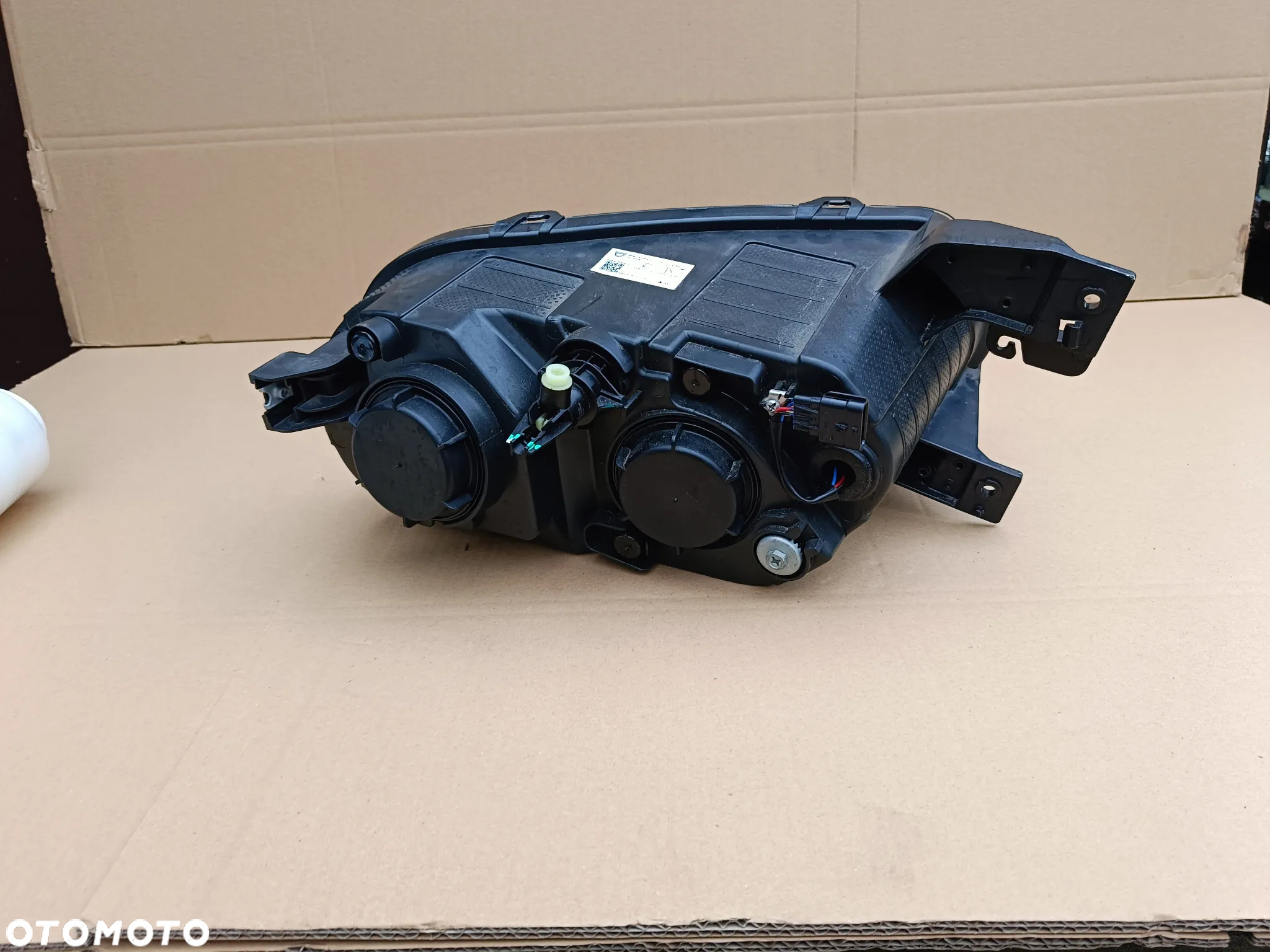 Lampa przednia lewa Dacia Spring reflektor 260607303 R - 2