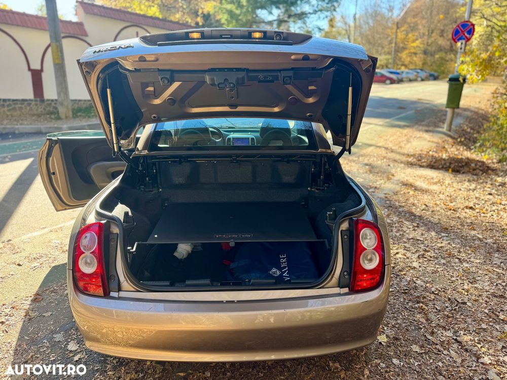 Nissan Micra 1.6 C+C Tekna + - 18