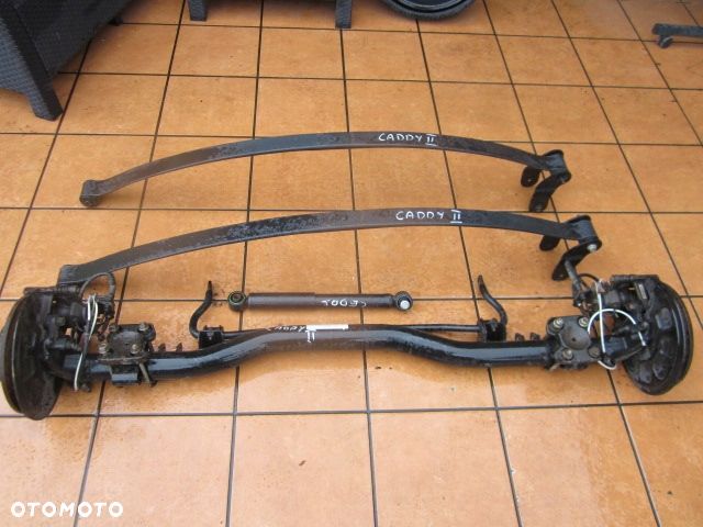 VW CADDY 2K5 LIFT BELKA TYŁ OŚ bez RESOR PODWÓJNY - 1