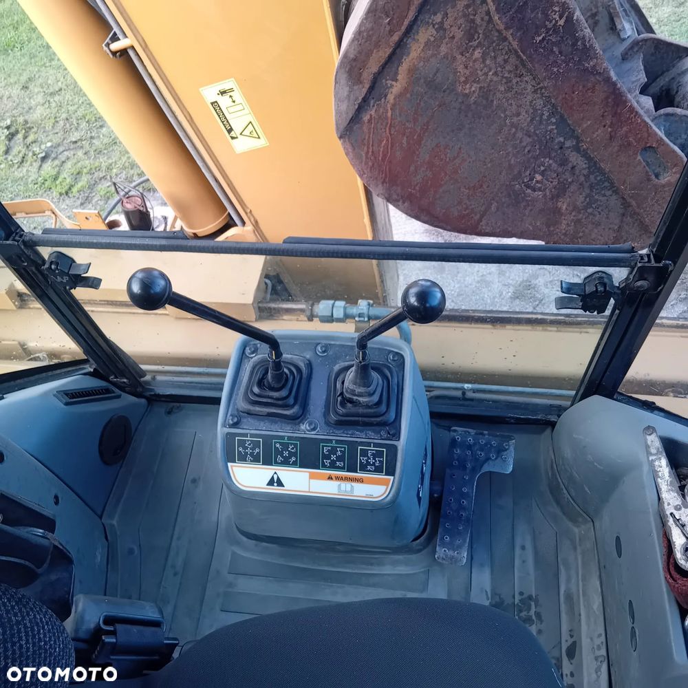 Caterpillar CAT 428D 4x4 - 11