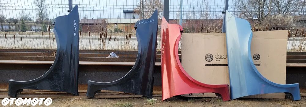 BŁOTNIK LAGUNA II PRAWY LEWY PRZÓD - 9