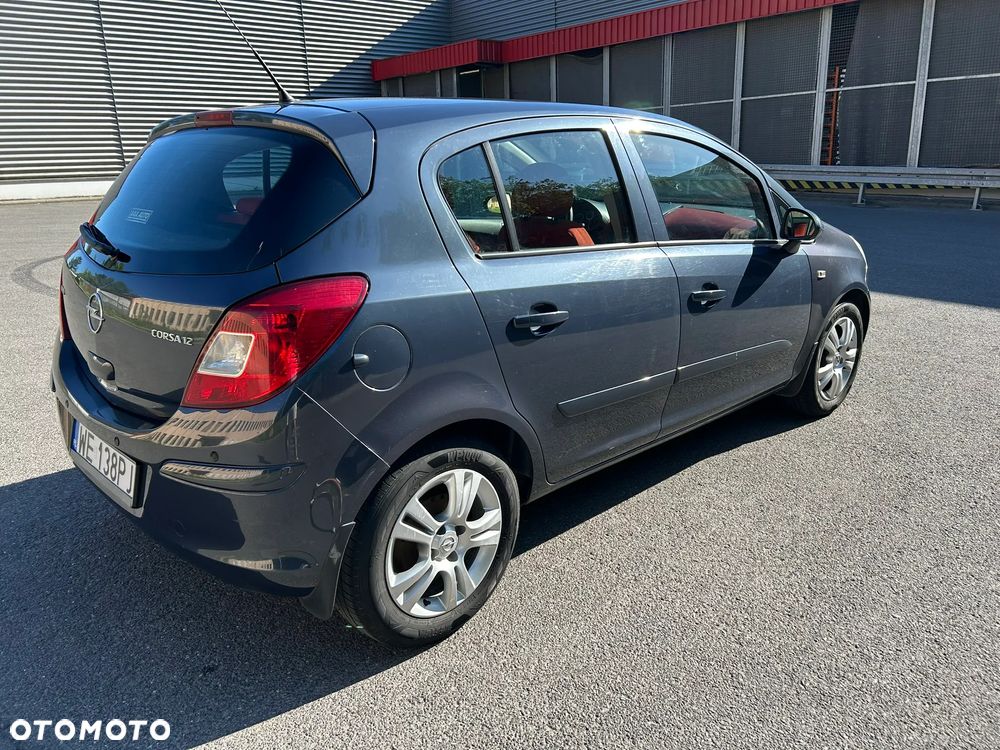 Opel Corsa 1.2 16V Enjoy - 8