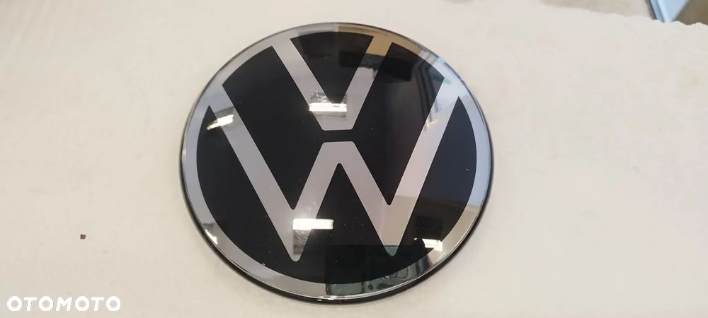 Emblemat Vw Polo 2018- T-Cross 2019- Touran 2016- T-Roc 2018- T-Roc Cabrio 2020- Nowy Oryginał 2GM853601E - 1