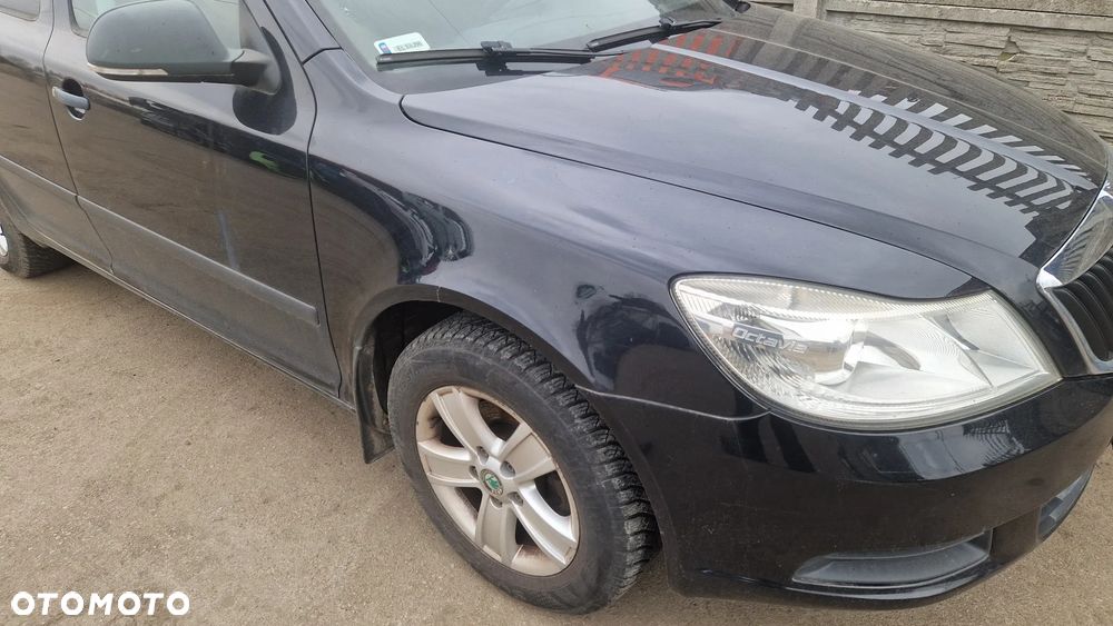 SKODA OCTAVIA II LIFT BŁOTNIK PRAWY PRZÓD 9910 - 1