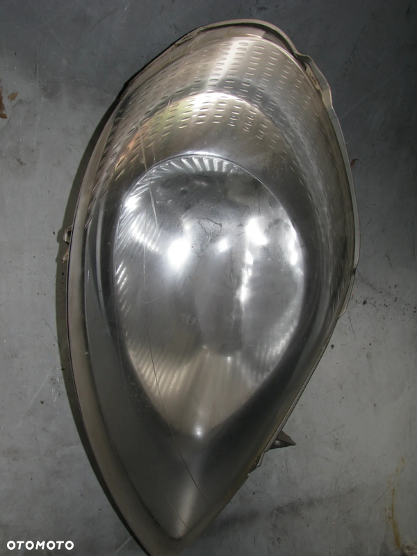 OPEL VIVARO A I 05r lampa prawa przod 7700311374 91165722