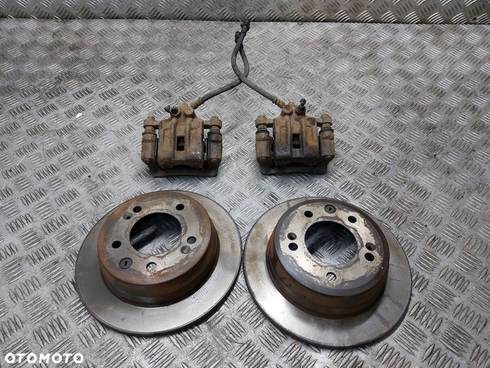 TARCZE HAMULCOWE TYŁ + ZACISKI HYUNDAI I30 I 1.6 CRDI - 1