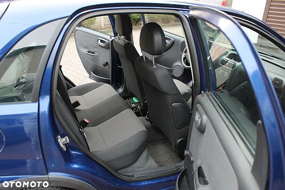 Opel Corsa 1.2 16V Cosmo - 12