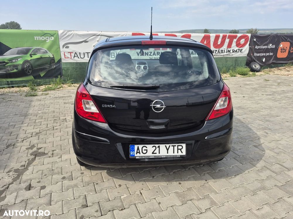 Opel Corsa 1.2i Cosmo - 11