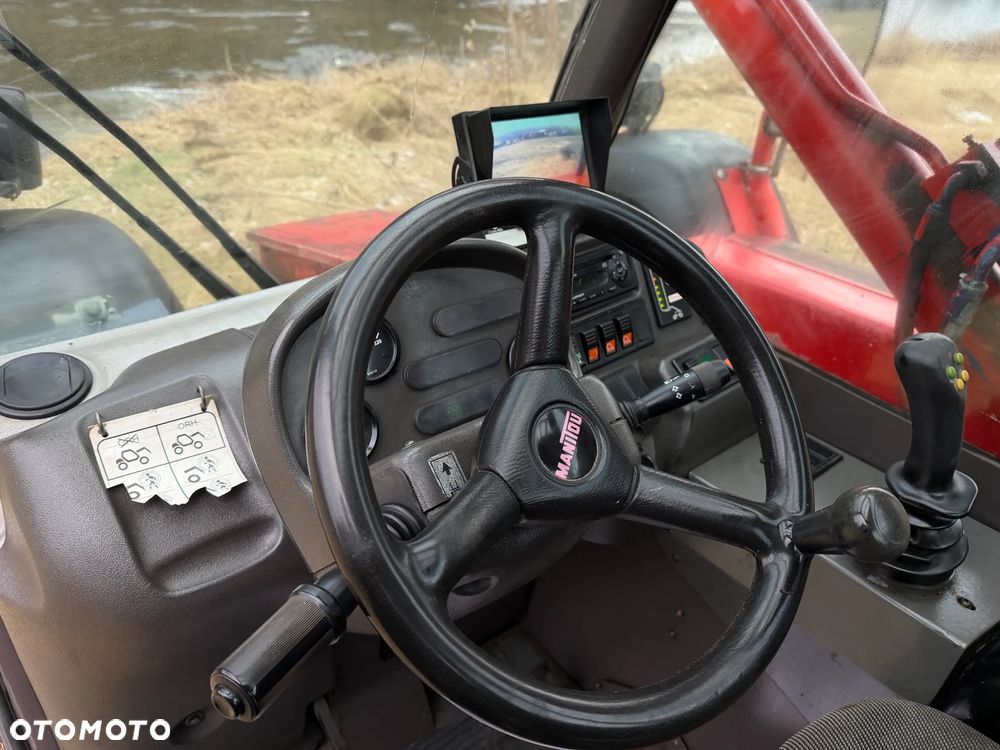 Manitou MLT523  Ładowarka teleskopowa 5m Wysięg 2,3 tony udzwig. Posuw wideł Hydrauliczny oraz rozsuwanie wideł hydr. Szybko-złącze hydrauliczne. 2x kamera PERKINS silnik TURBO  z Komuny Norweskiej! Jak Nowa 4287 mtg Zero luzów wycieków SERWISOWANA w  DEKRA.  Opony jak Nowe. Napęd 4x4 Hydrostatic REWERS - 31