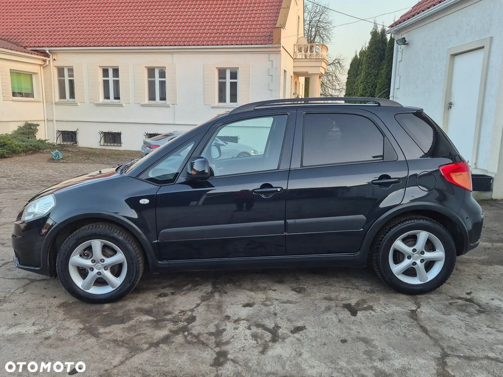 Suzuki SX4 1.6 GLX / Comfort - 9