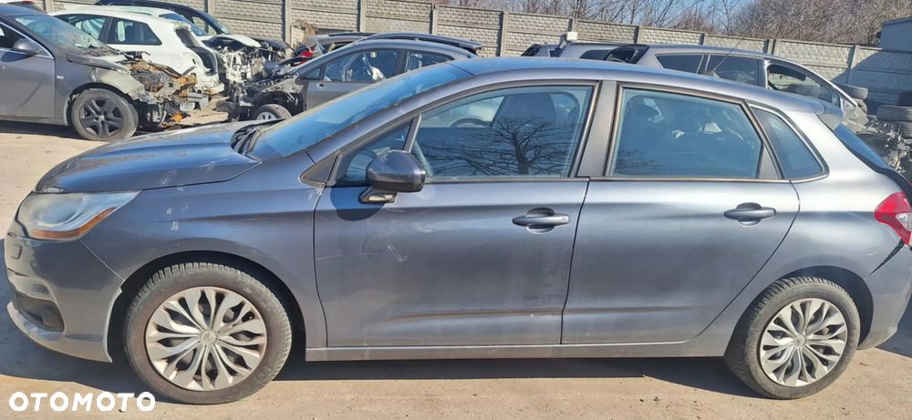 Citroen C4 II B7 lampa prawy przód - 7
