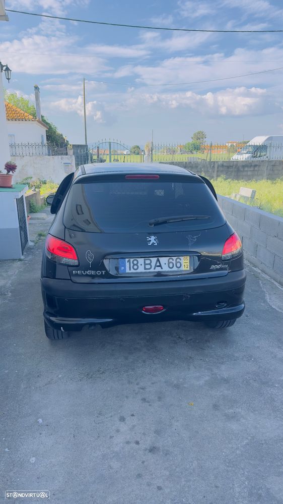 Peugeot 206 ver-hdi-90-premium - 9