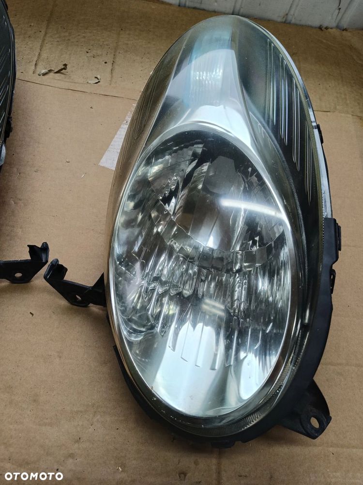 Micra K12 lampa przednia przód lift LEWA EUROPA Nissan - 1