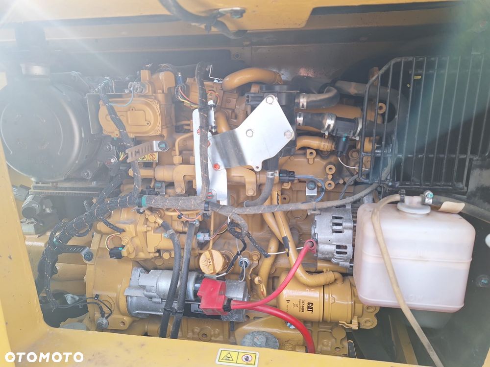Caterpillar 310 - 7