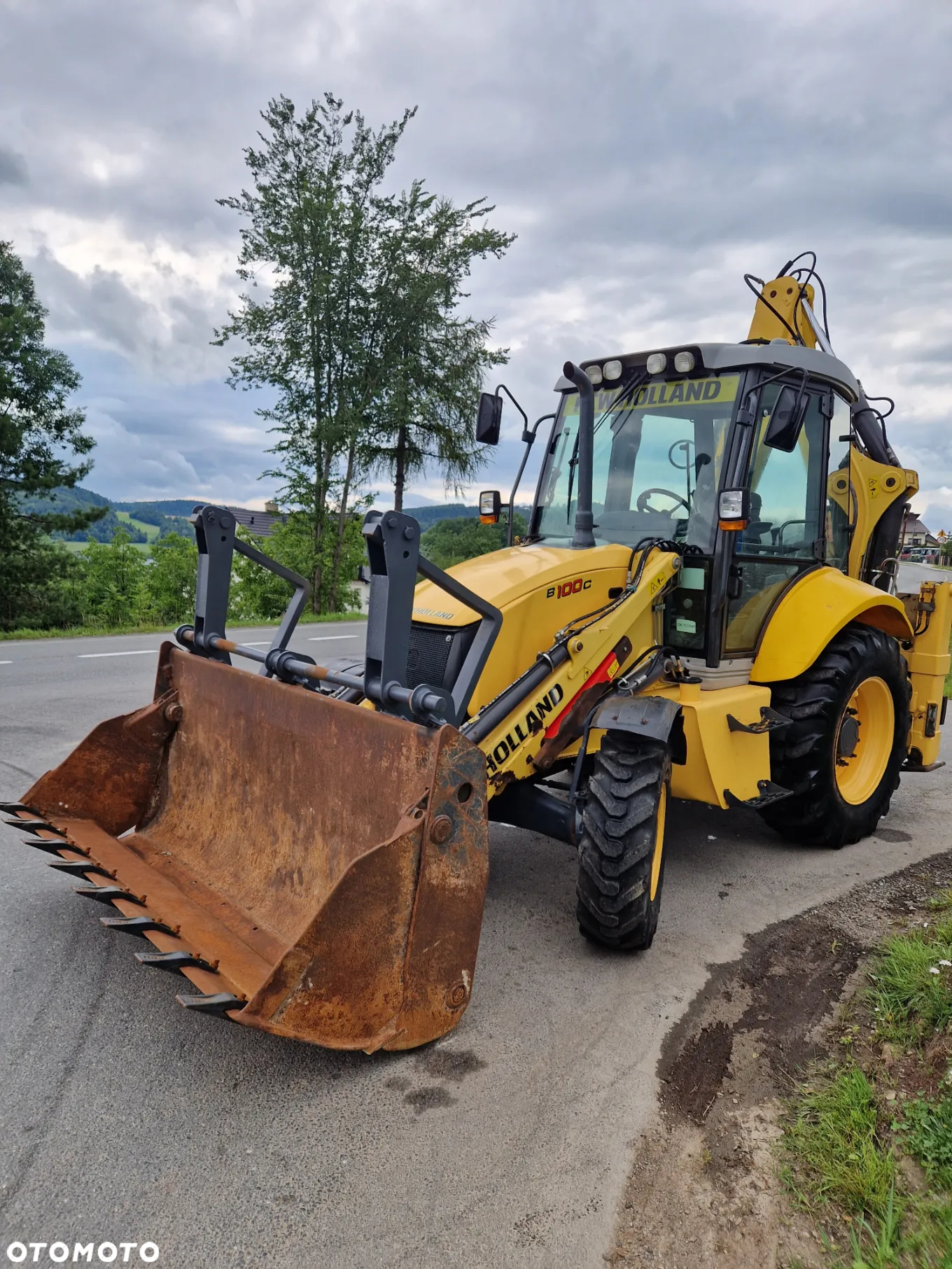 New Holland B100C - 4