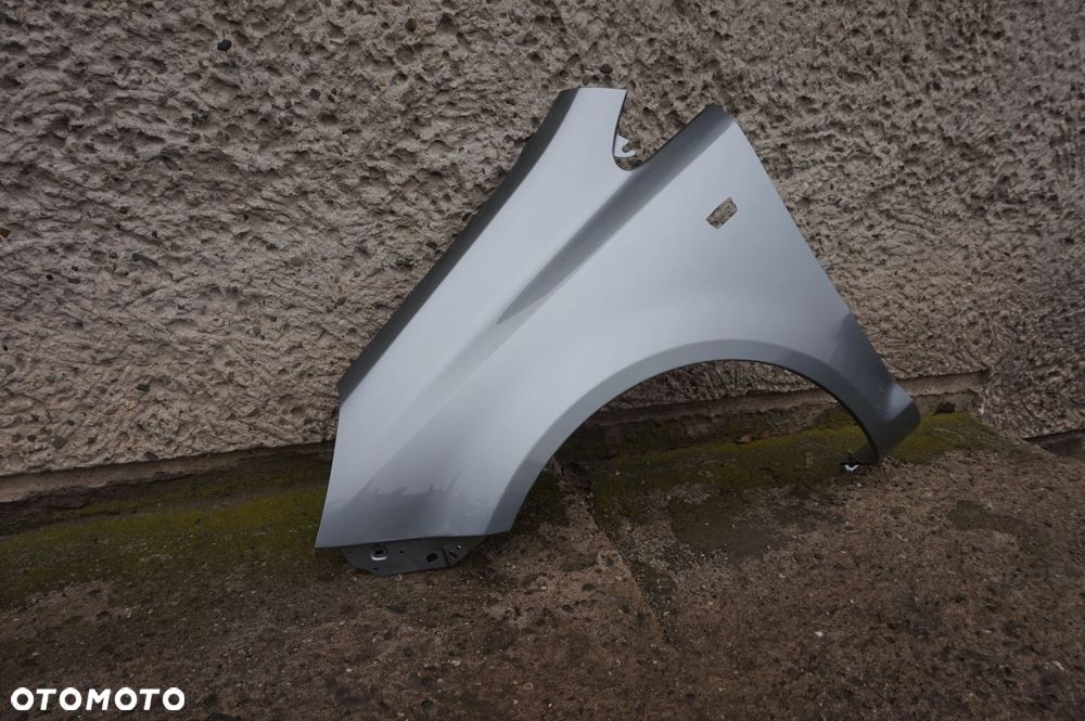 BŁOTNIK PRZEDNI LEWY OPEL CORSA D Z179 - 1