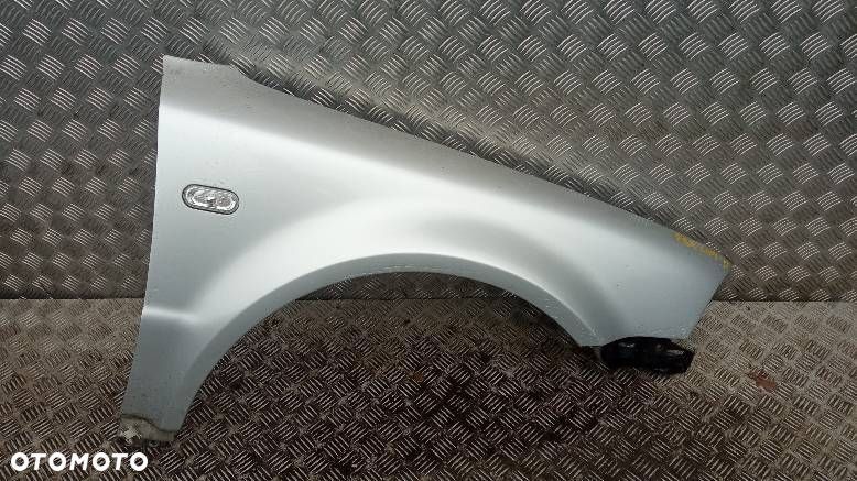 BŁOTNIK PRAWY PRZEDNI VOLKSWAGEN PASSAT B5 - 1