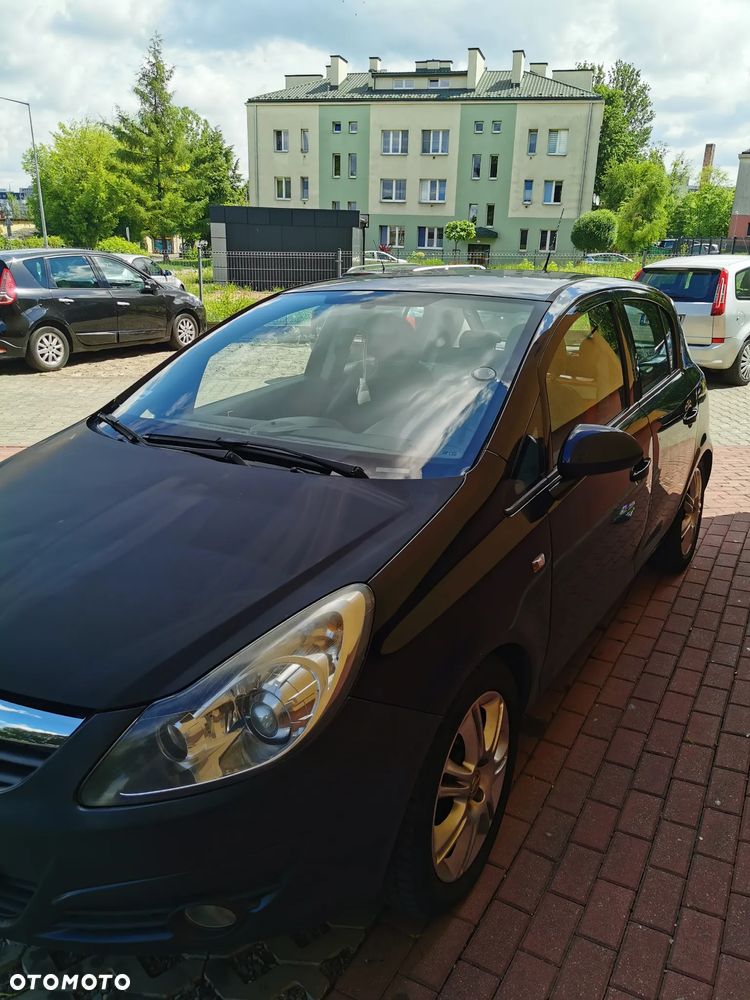 Opel Corsa 1.4 16V Enjoy - 11