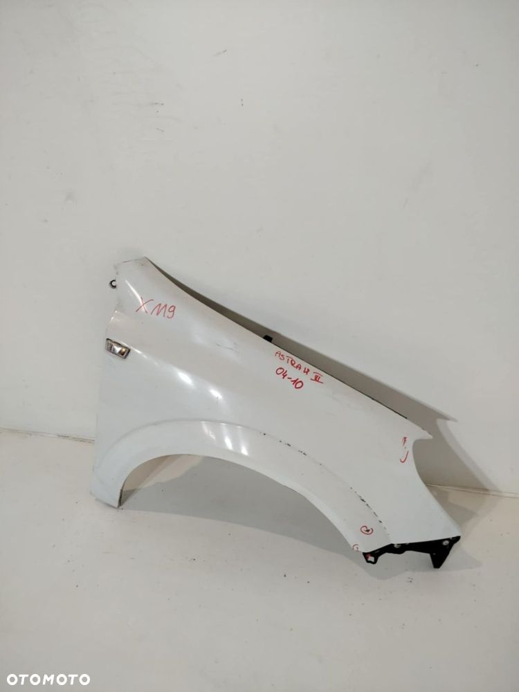 BŁOTNIK PRAWY PRZEDNI OPEL ASTRA III H 04-09 - 1