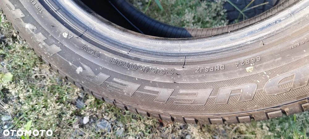 235/50/18 bridgestone dueler h/t sport - 2