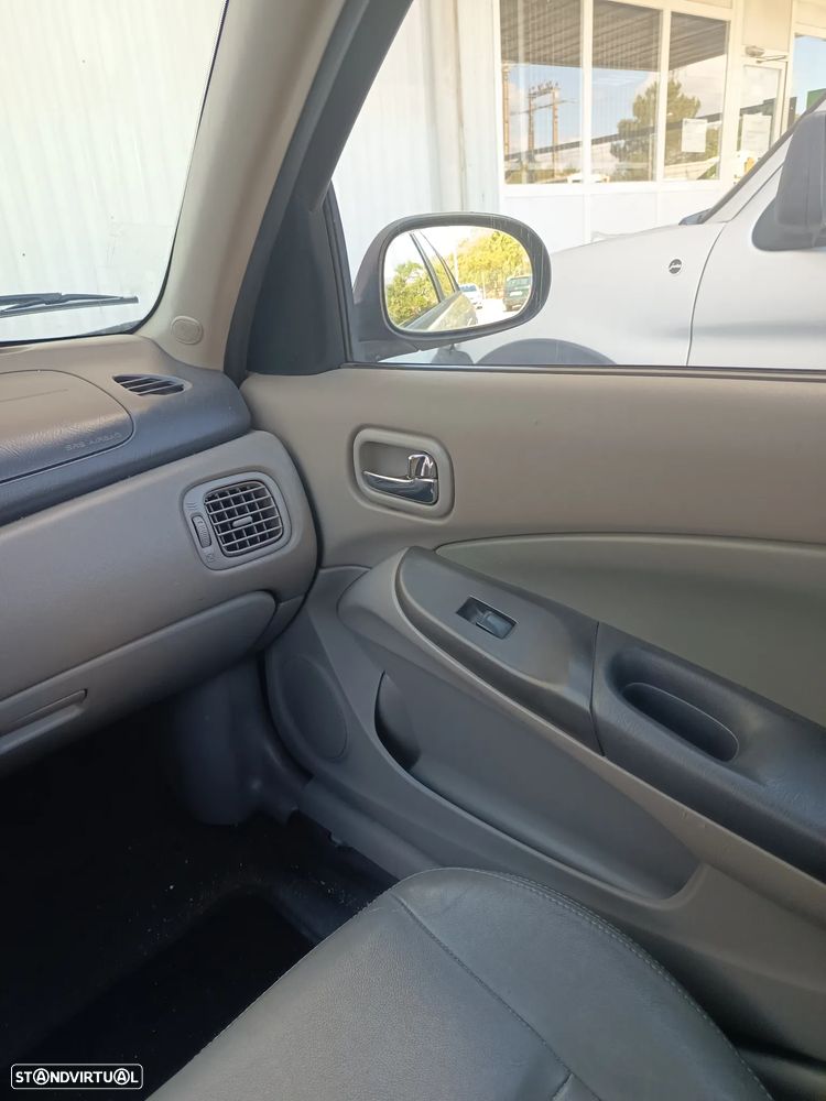Nissan Almera 1.5 Luxury ABS+AC - 13