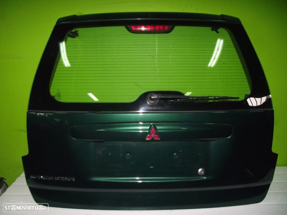 Tampa da Mala Mitsubishi Space Star - 1998 / 2006 - TM183 - 1
