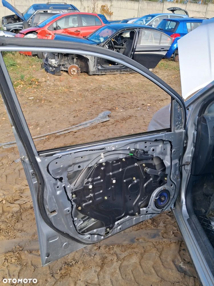 Daihatsu cuore 03 drzwi lewy przód E28 - 6