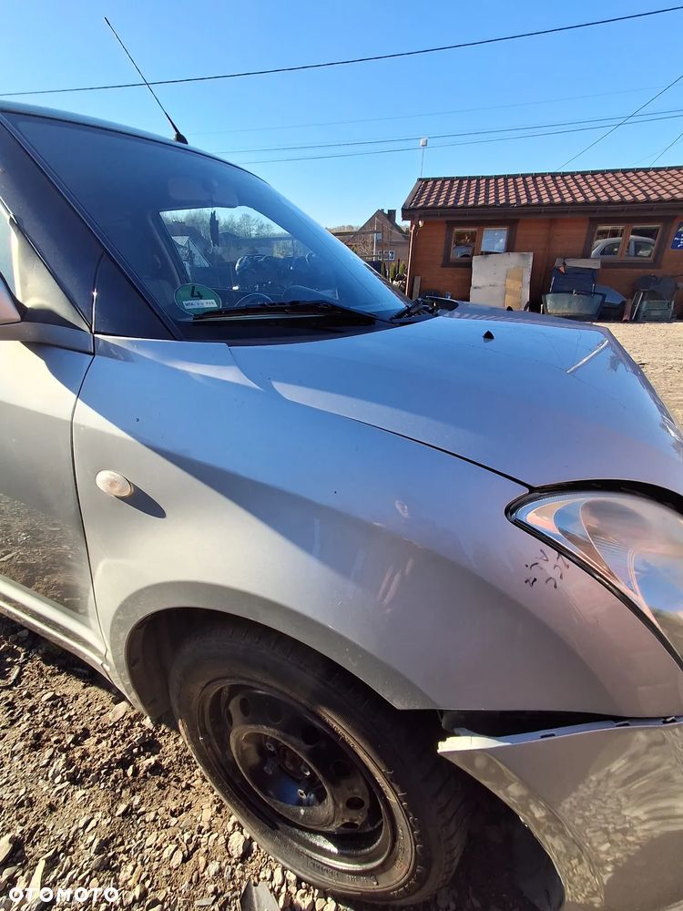 Suzuki Swift 3d 05 Blotnik prawy ZCC - 3