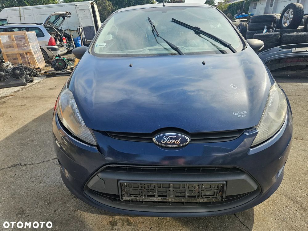 FORD FIESTA MK7 BŁOTNIK LEWY PRZÓD PRZEDNI E9 - 19