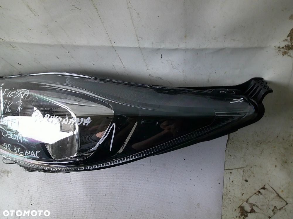 ford fiesta mk7 lampa przód lewa nowa oryg z uszk - 9