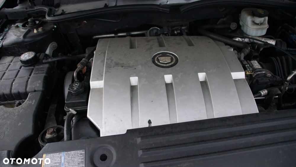 Auto na części - Cadillac DTS 4.6 V8 295 KM LD8 2008R Silnik Skrzynia Drzwi Zderzak Błotnik Lampa Lusterko Szyba Klapa Deska Kokpit Sterownik Moduł Czujnik Licznik Wyświetlacz Kierownica Panel - 18