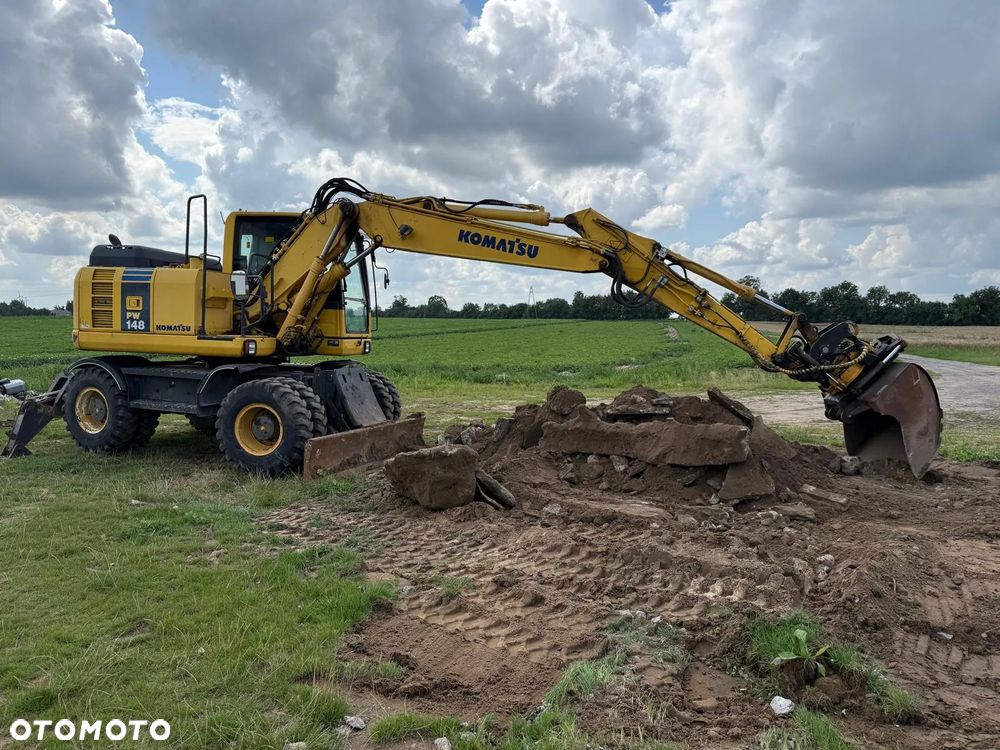 Komatsu Koparka kołowa Komatsu PW 148 Pług podpory Klima Centralne smarowanie Rototil Ramię 2 razy łamane PIĘKNA - 30