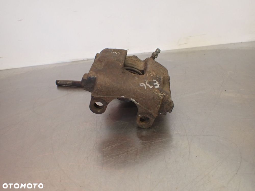ZACISK HAMULCA PRAWY TYŁ BMW E36 - 1