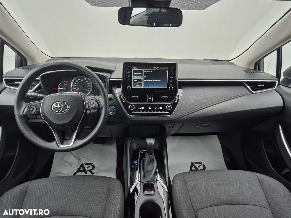 Toyota Corolla 1.8 HSD Active - 12