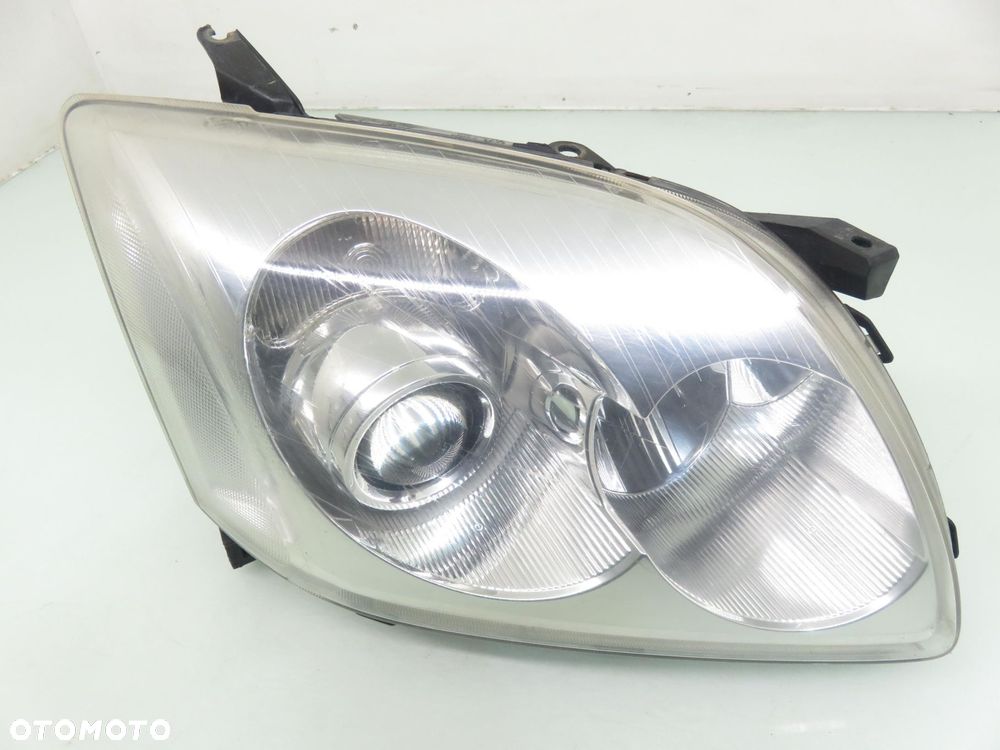 LAMPA PRAWA PRZEDNIA TOYOTA AVENSIS II T25 XENON - 14