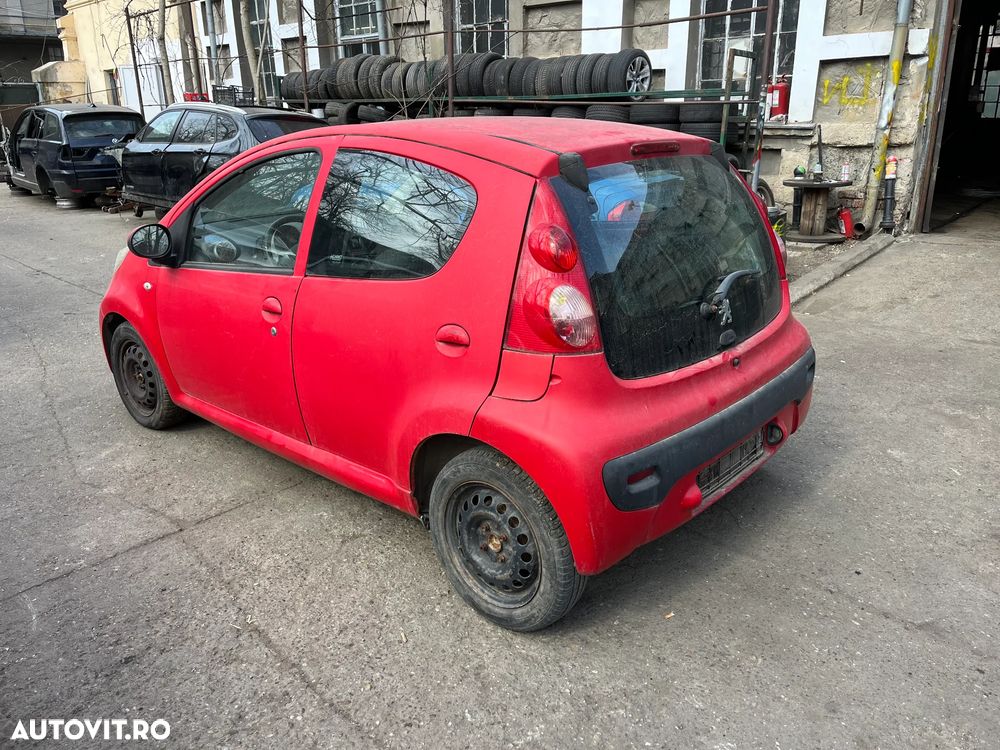 Dezmembrez Peugeot 107 rosu 2007 1.0 benzina 4usi - 3
