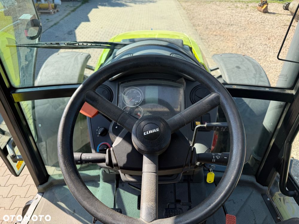 Claas Axos 320 - 17